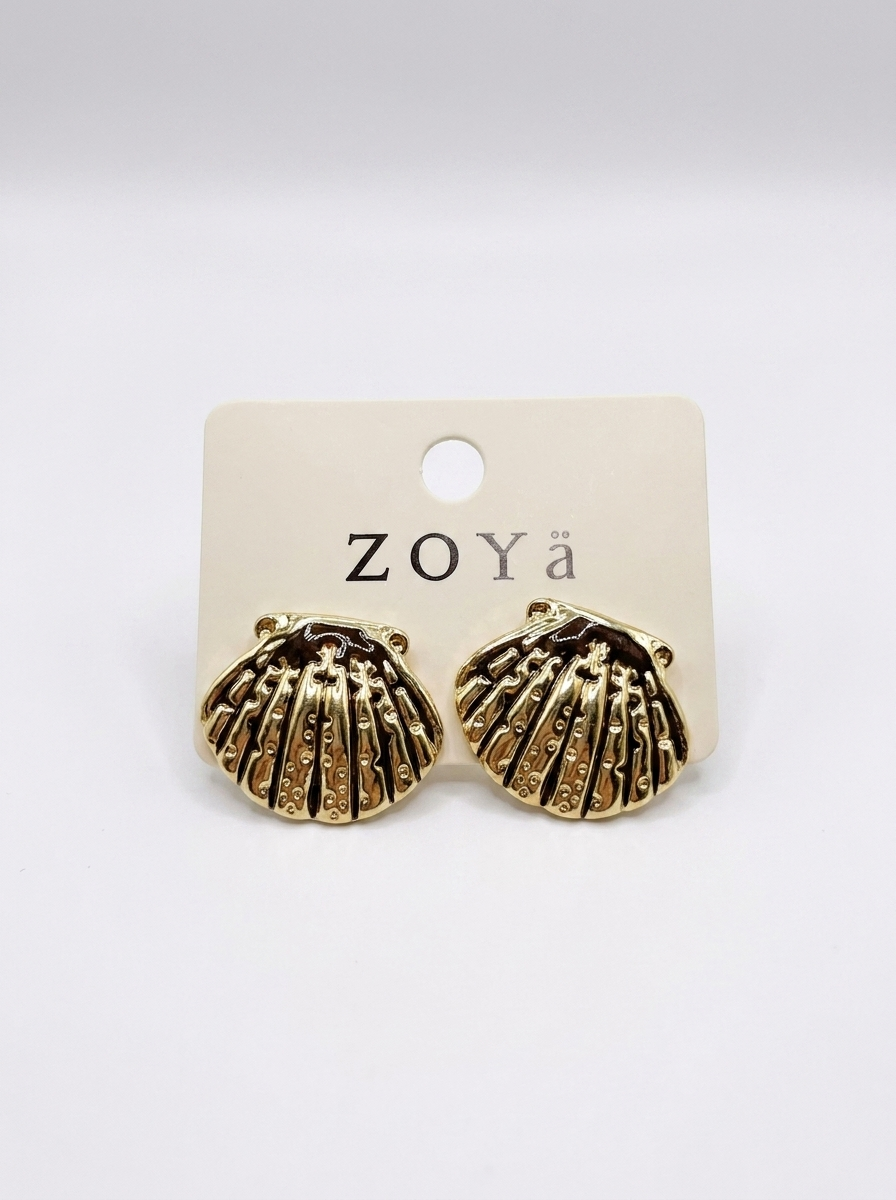 A pair of gold dome earrings