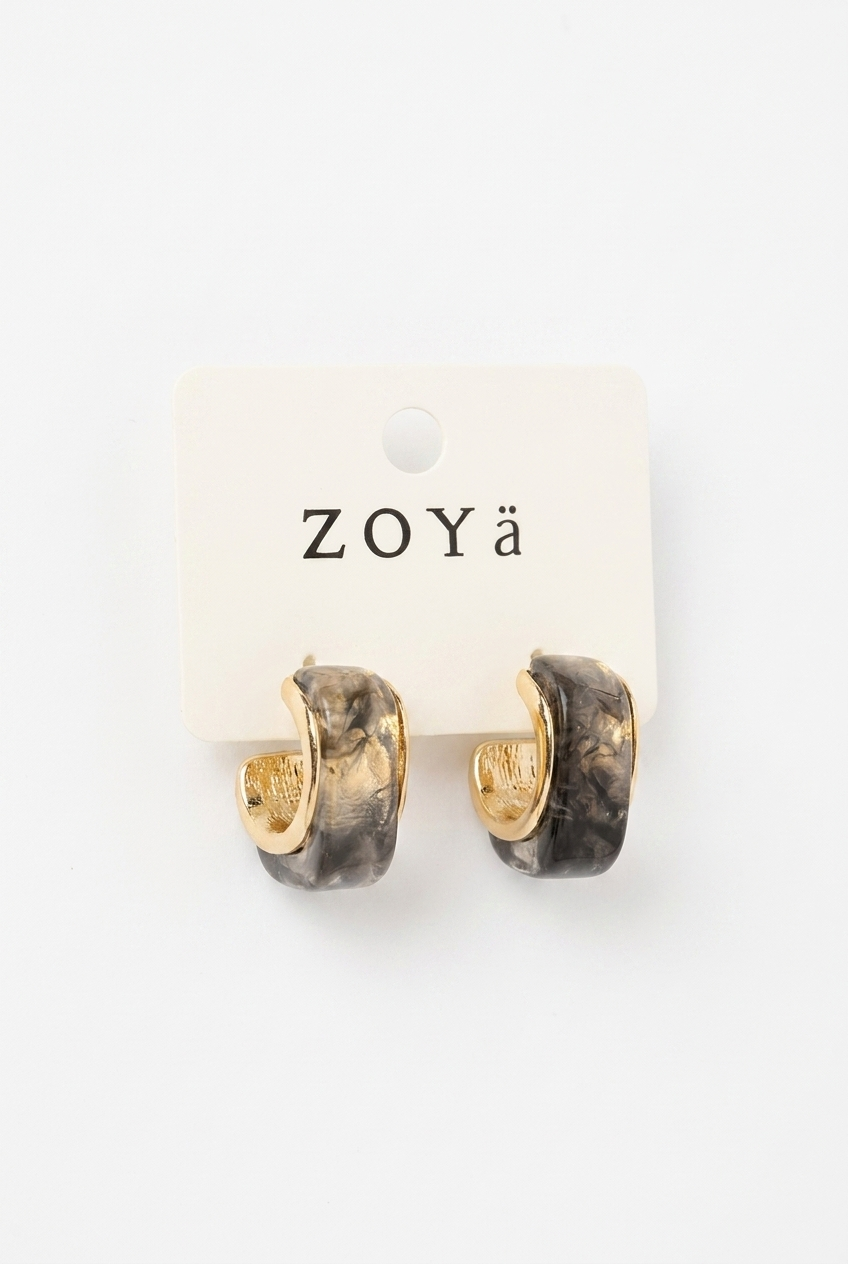 A pair of gold dome earrings