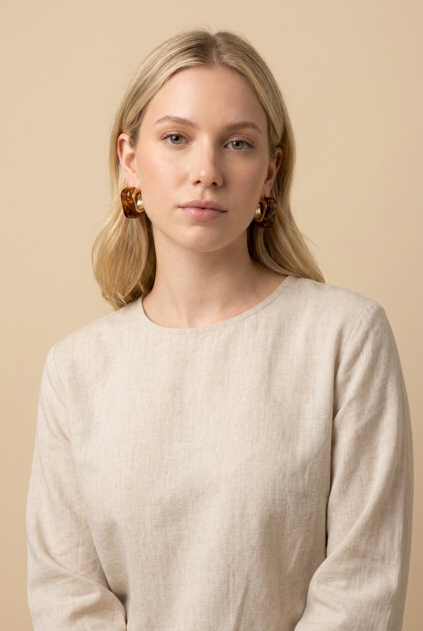 A pair of gold dome earrings