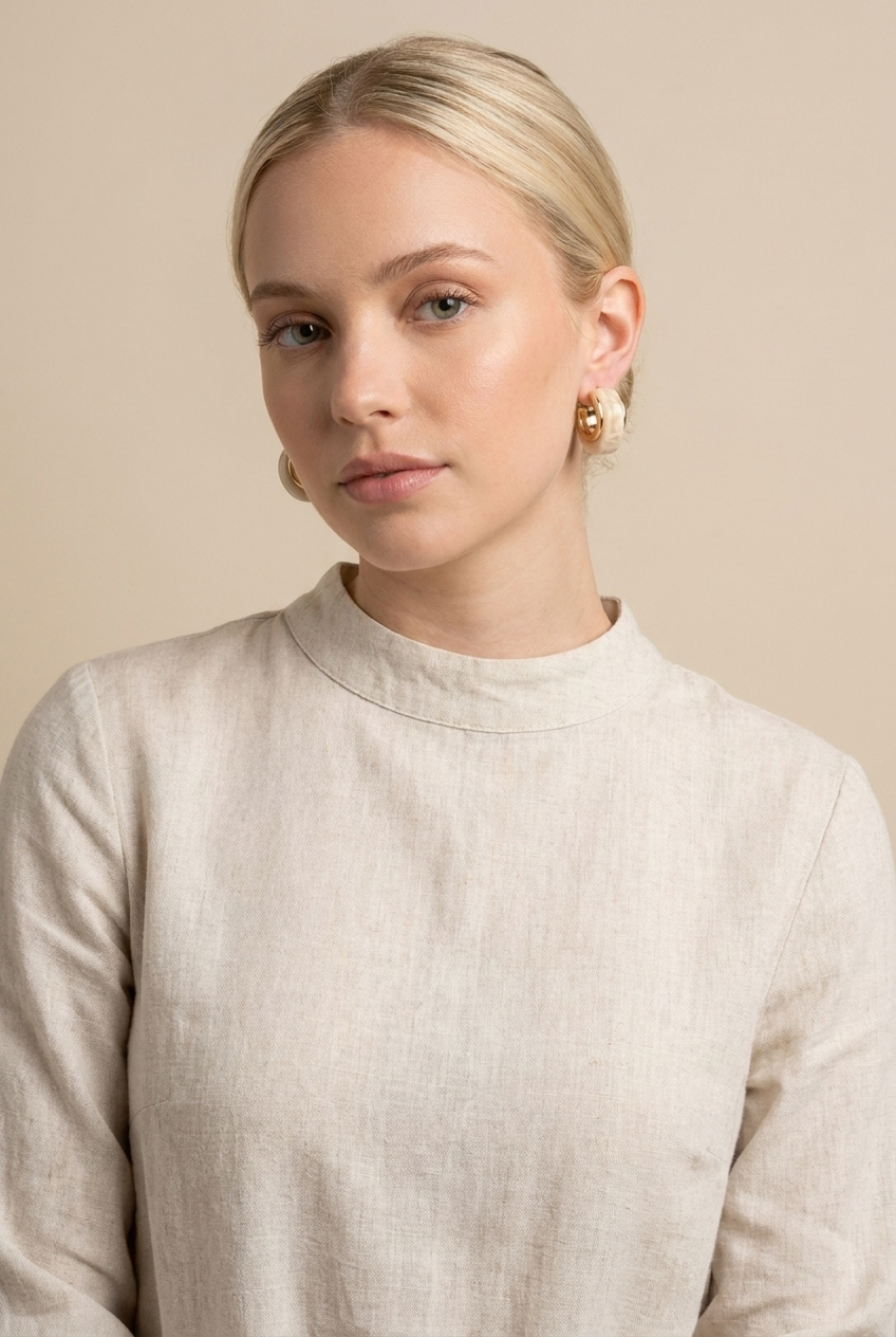 A pair of gold dome earrings